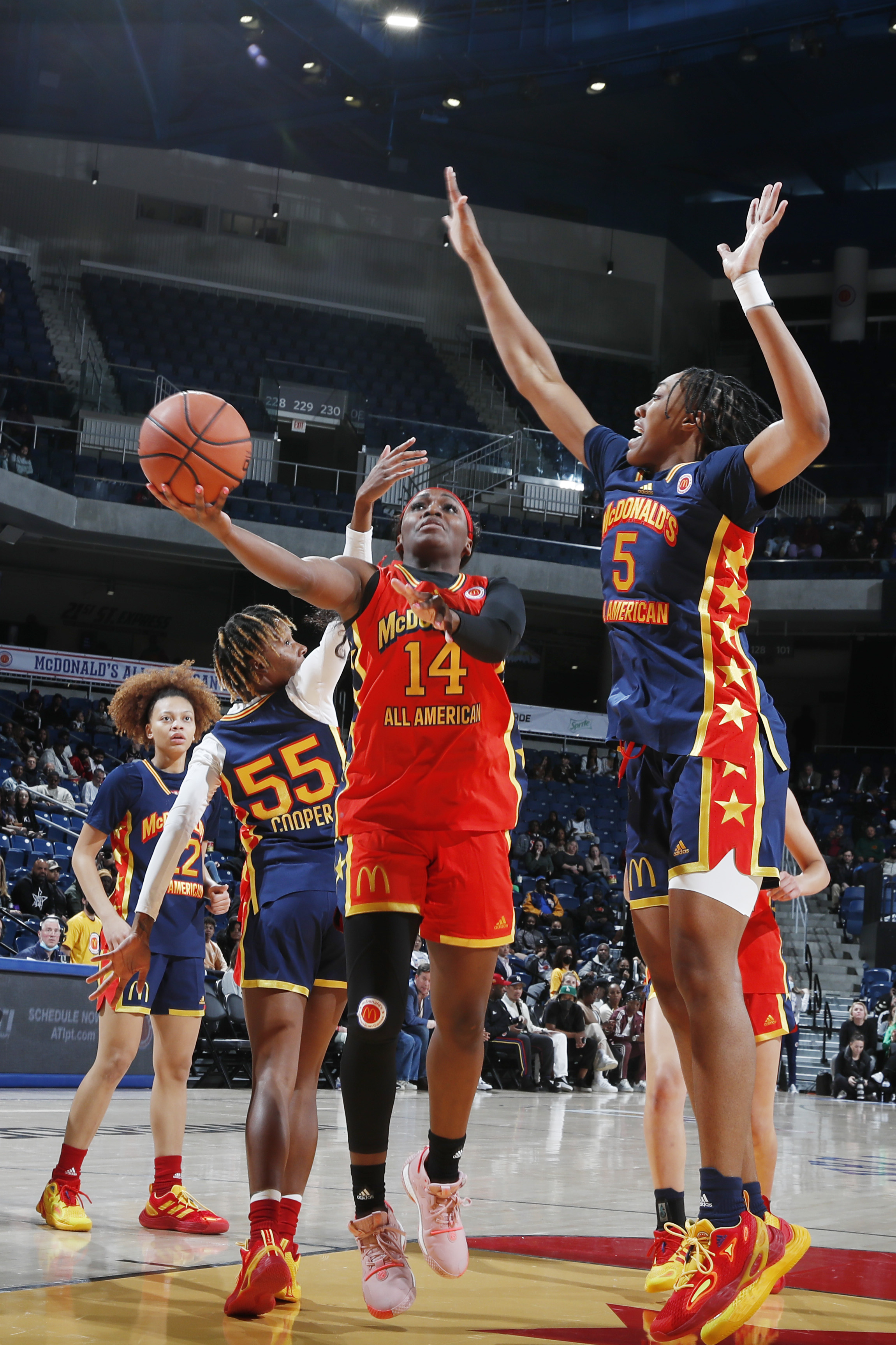 CHICAGO, IL - MARCH 29:  McDonalds All American Kk Bransford (14)  takes a shot against Ashlyn Watkins (5) during the 2022 McDonalds High School All American Girls Game at Wintrust Arena. (Photo by Brian Spurlock/Icon Sportswire)